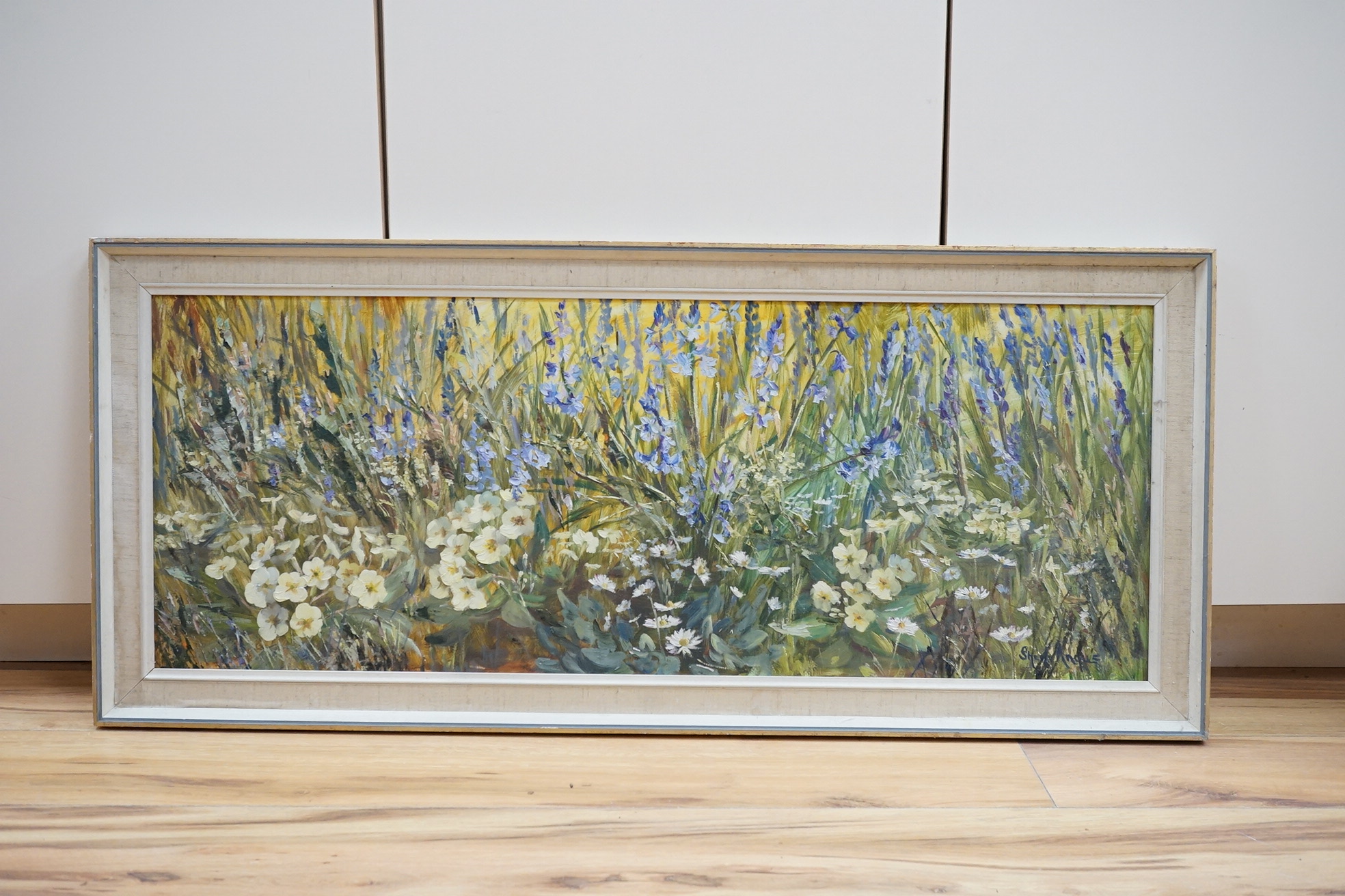 Sheila Angus (20th. C), oil on board, ‘May Flowers’, signed, 34 x 90cm. Condition - fair/good